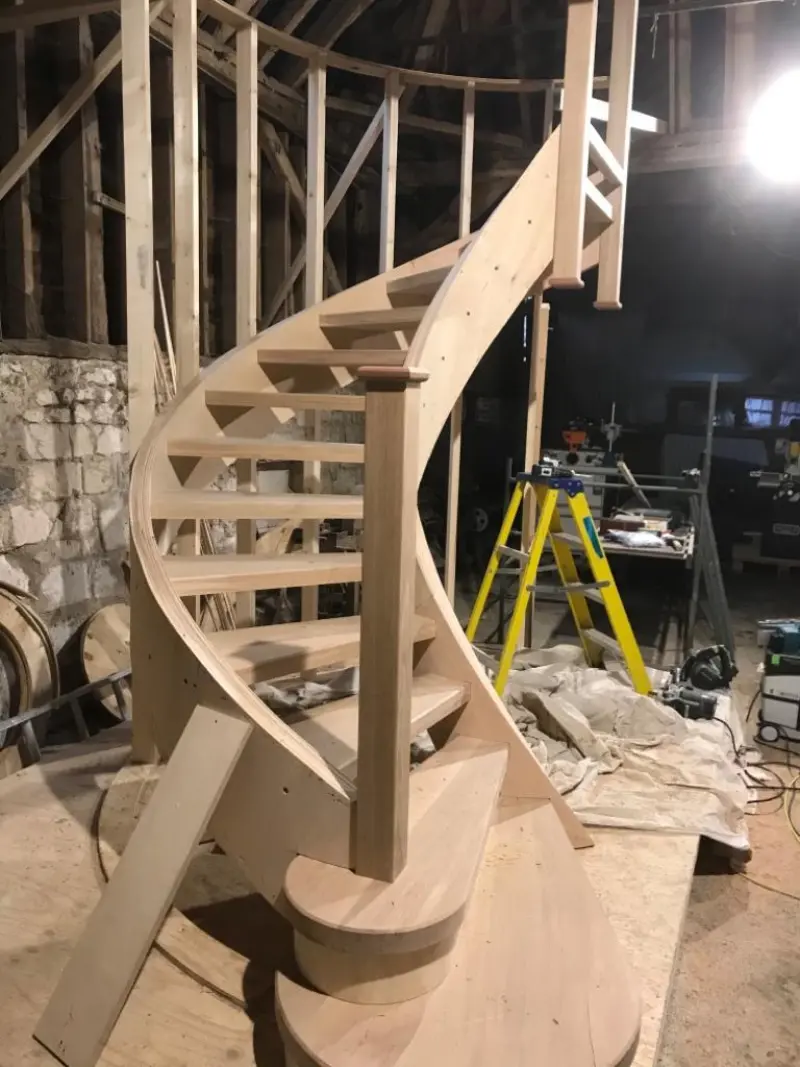 Curved oak staircase being built in workshop
