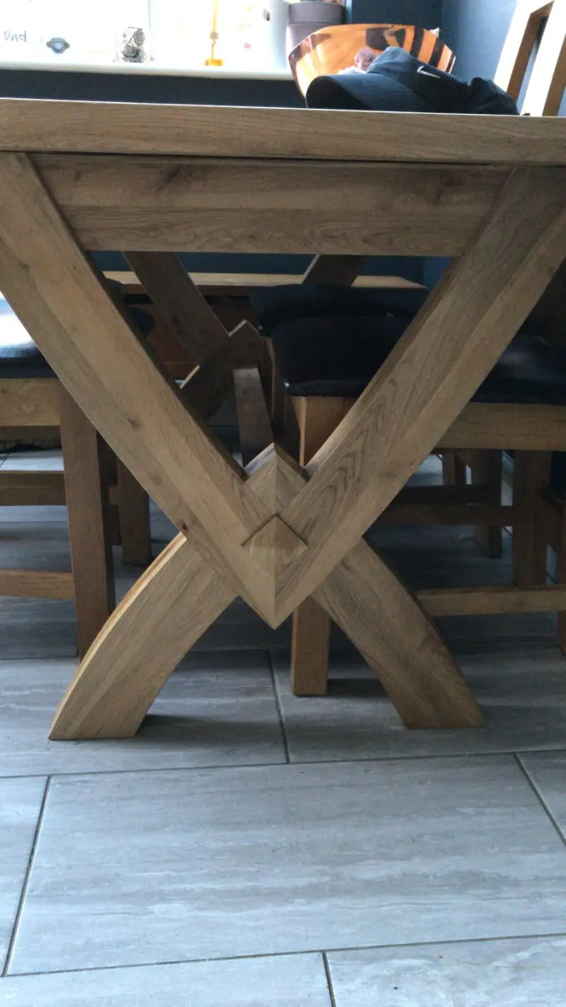Cross-leg oak table joinery detail