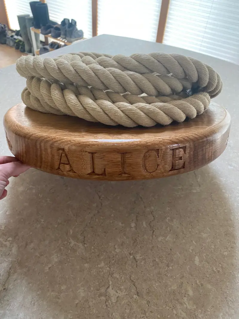 Engraved oak rope fender