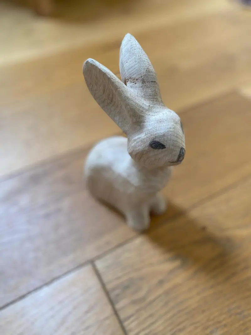 Hand-carved wooden rabbit figurine