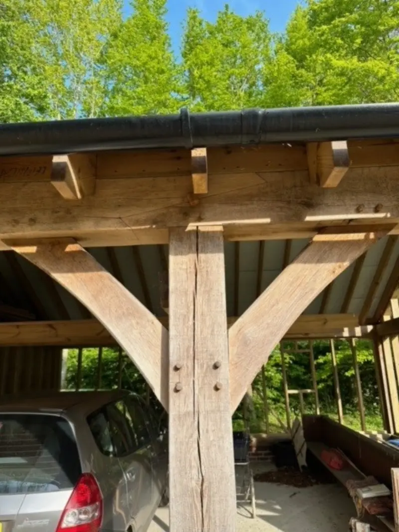 Oak carport bracket and beam joinery detail