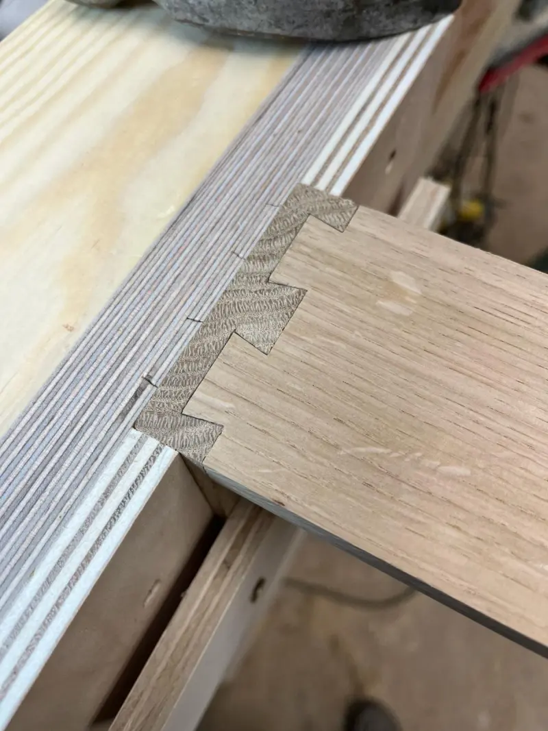 Hand-cut dovetail joints close-up