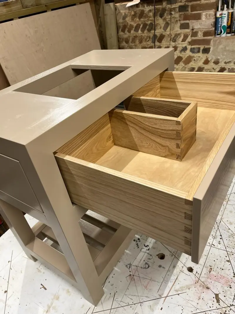 Kitchen cabinet with dovetail-jointed oak drawers